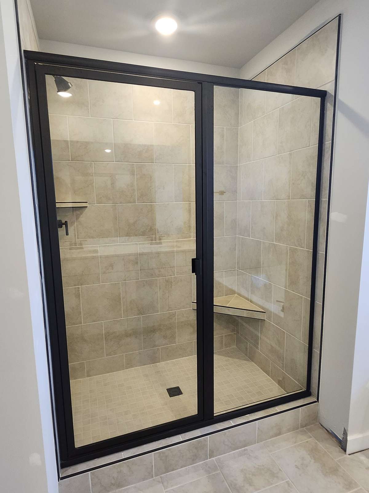 Primary bathroom - full tile shower