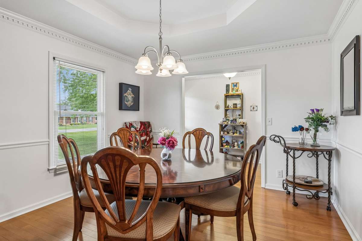 Formal dining features a trey ceiling, chair rail and crown molding! 2104 Red Mile Rd, Murfreesboro, TN 37127