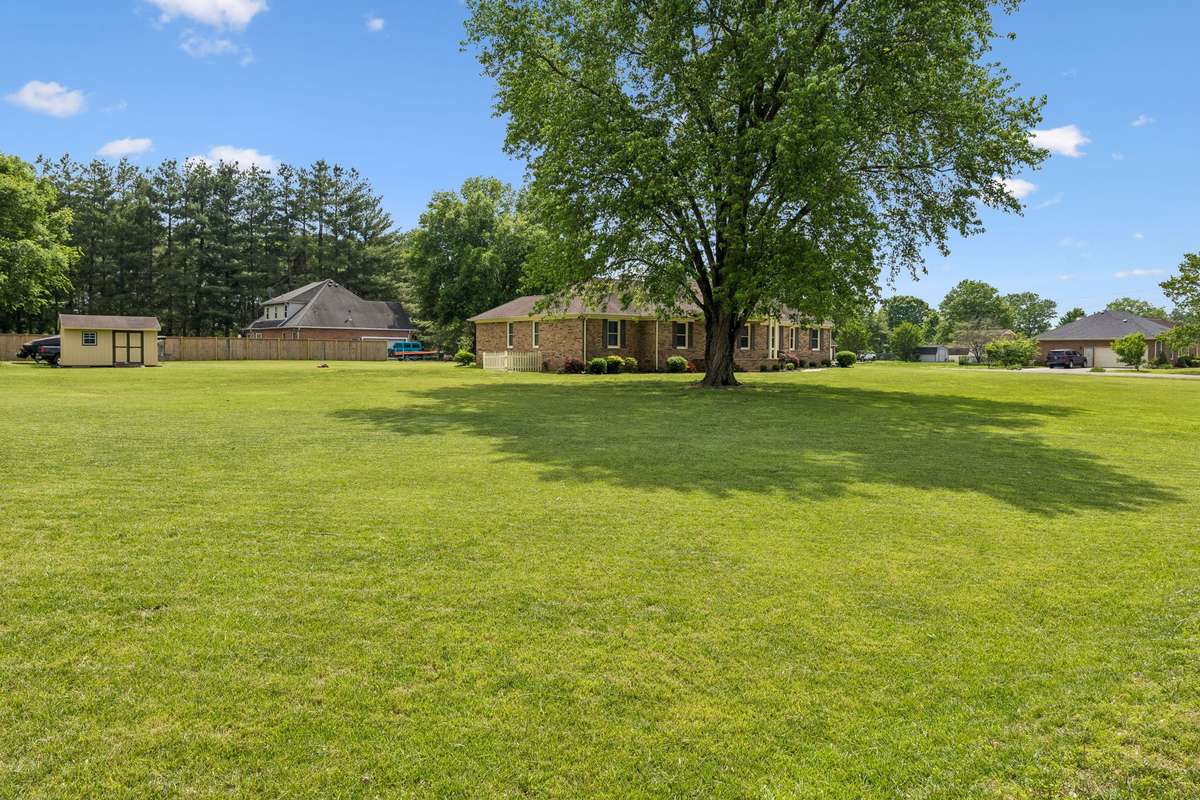 An acre corner lot within a short drive to shopping & restaurants! 2104 Red Mile Rd, Murfreesboro, TN 37127