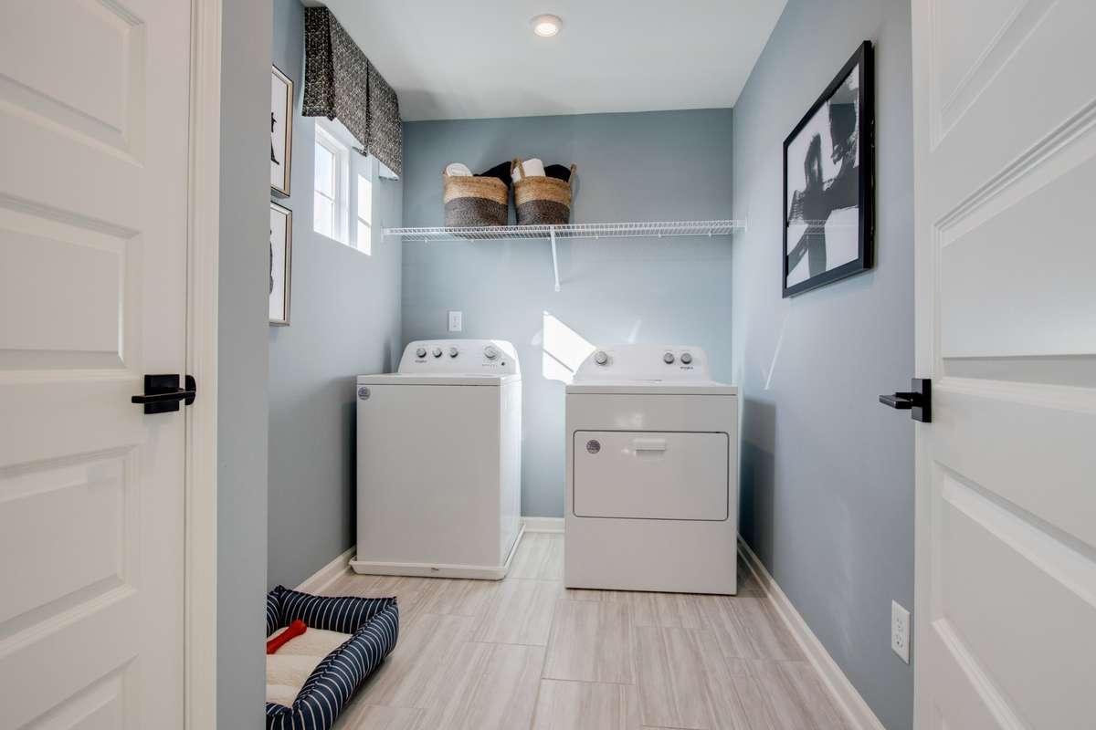 **Photos are of the model home that's available. Huge Laundry with extra closet/storage space.