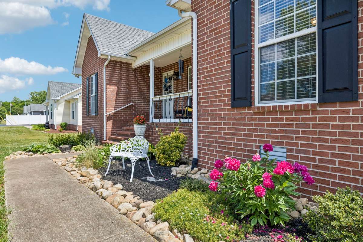 The landscaping is lovely with bright colored flowers!