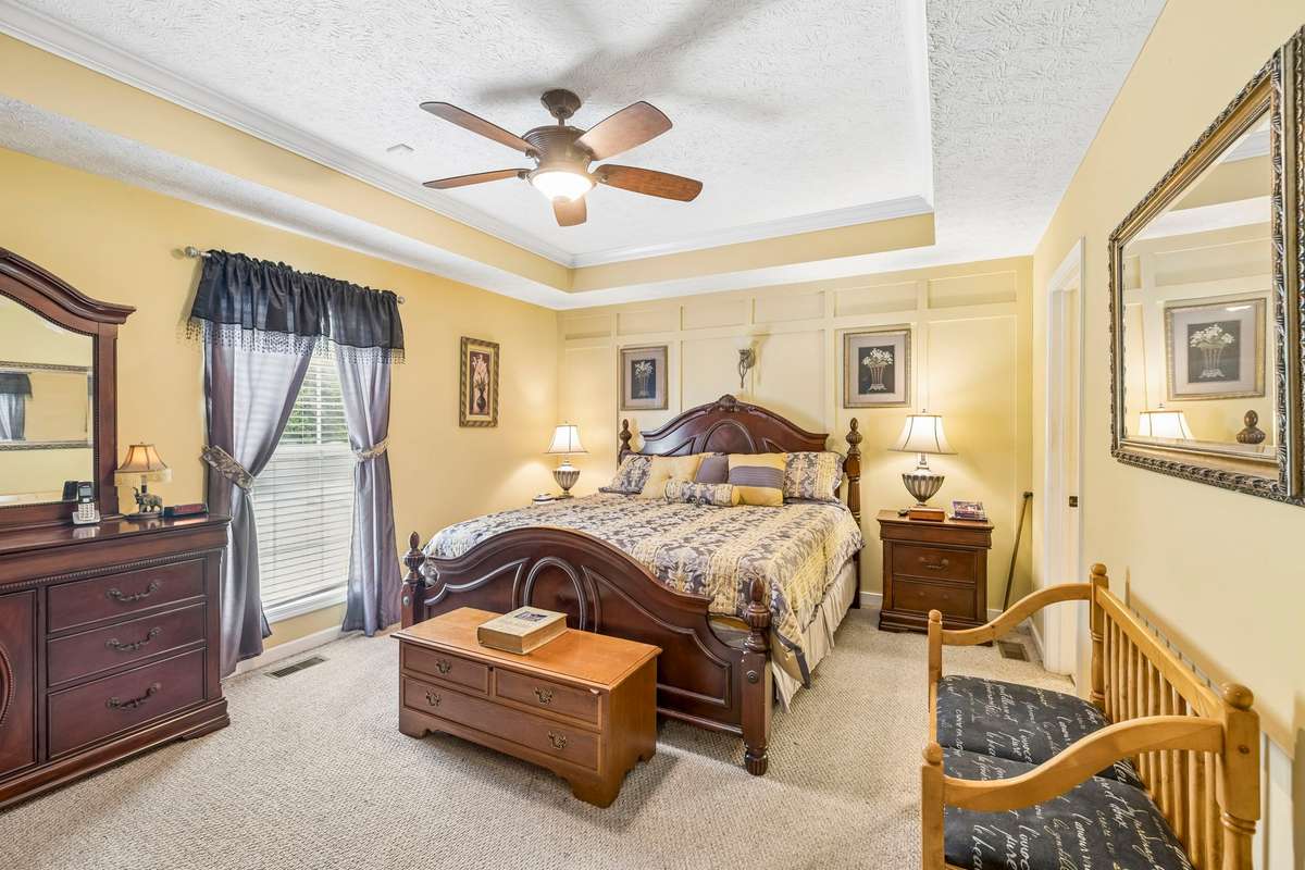This home has a split floor plan with the Primary Suite located on one end, complete with carpet, trey ceiling, walk-in closet, and adjoining full Bath!