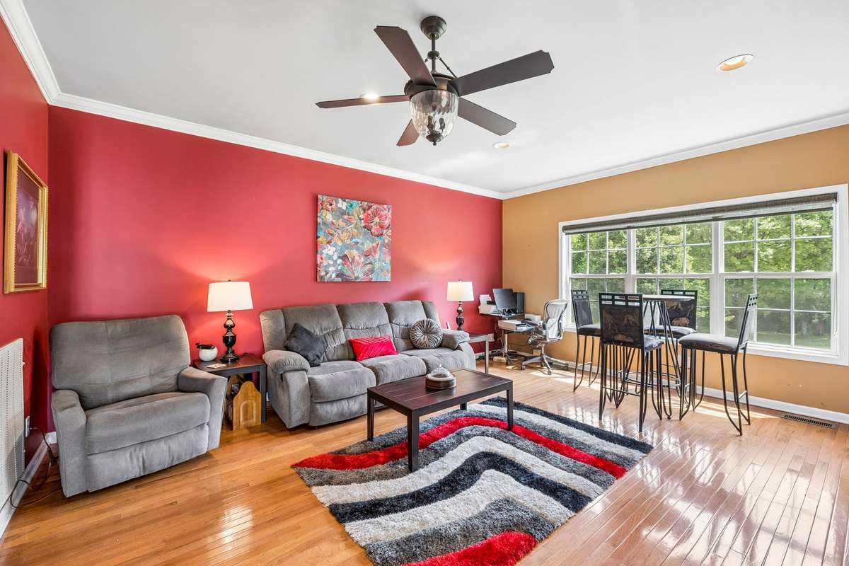 This room allows for anything you wish to have in this area, has the finished hardwood flooring, a closet and a half Bath!