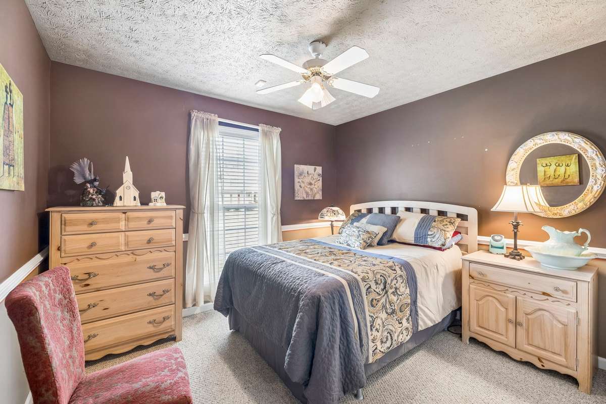 Bedroom 2 and 3 are located on the other side of the home separate by another full Bath in this functional split floor plan! This is Bedroom 2!