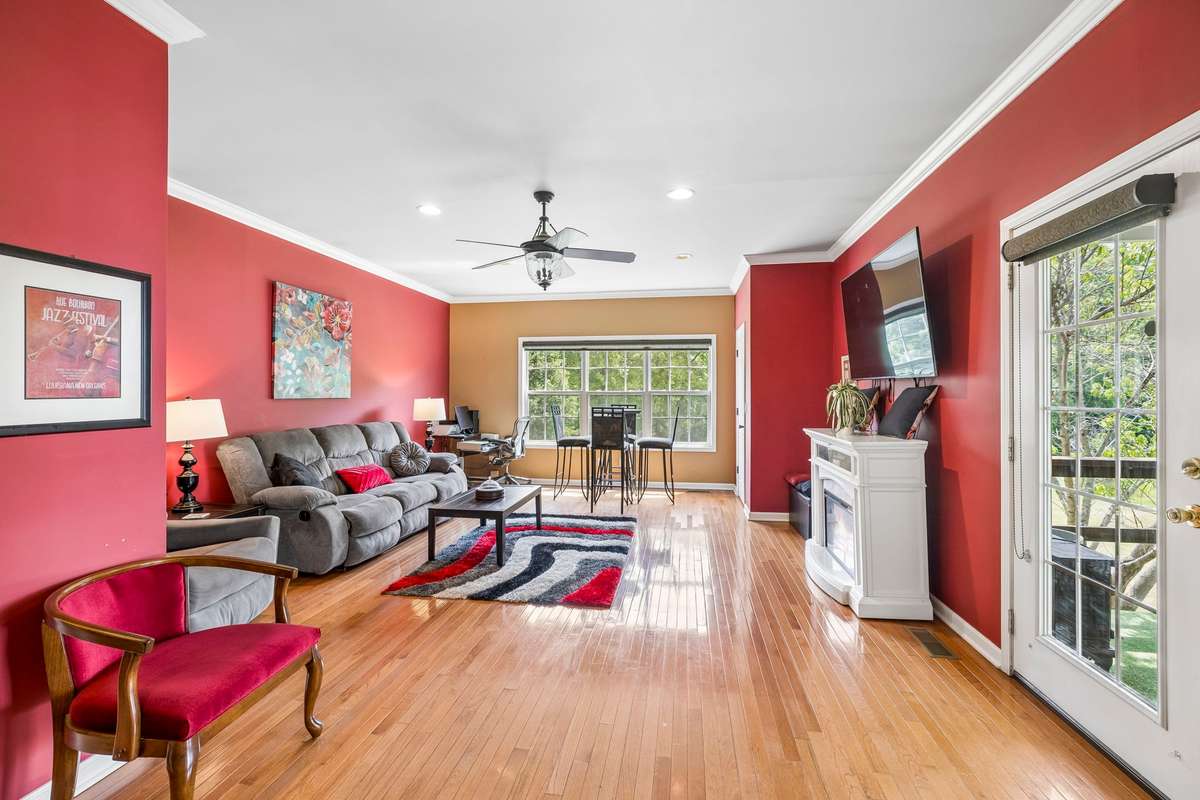 This home offers a main floor flex space that we'll refer to as the Bonus/Media/Family Room which is located off the Living Room with views of the back yard. The french doors to the right lead to the rear covered deck!