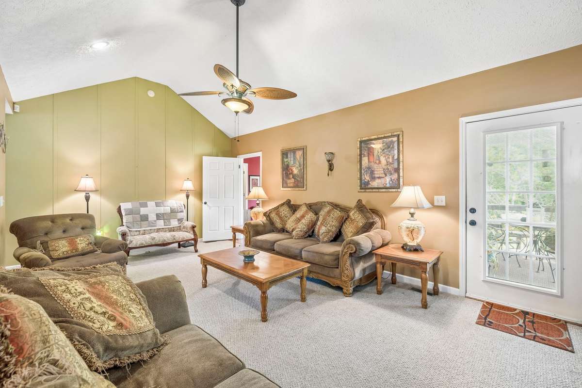 The doorway leads to a rear covered deck!