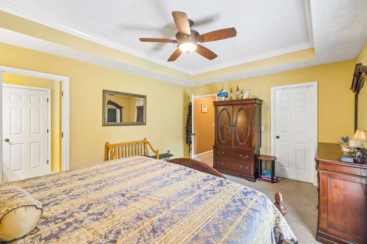The white door on the right goes to the walk-in closet.