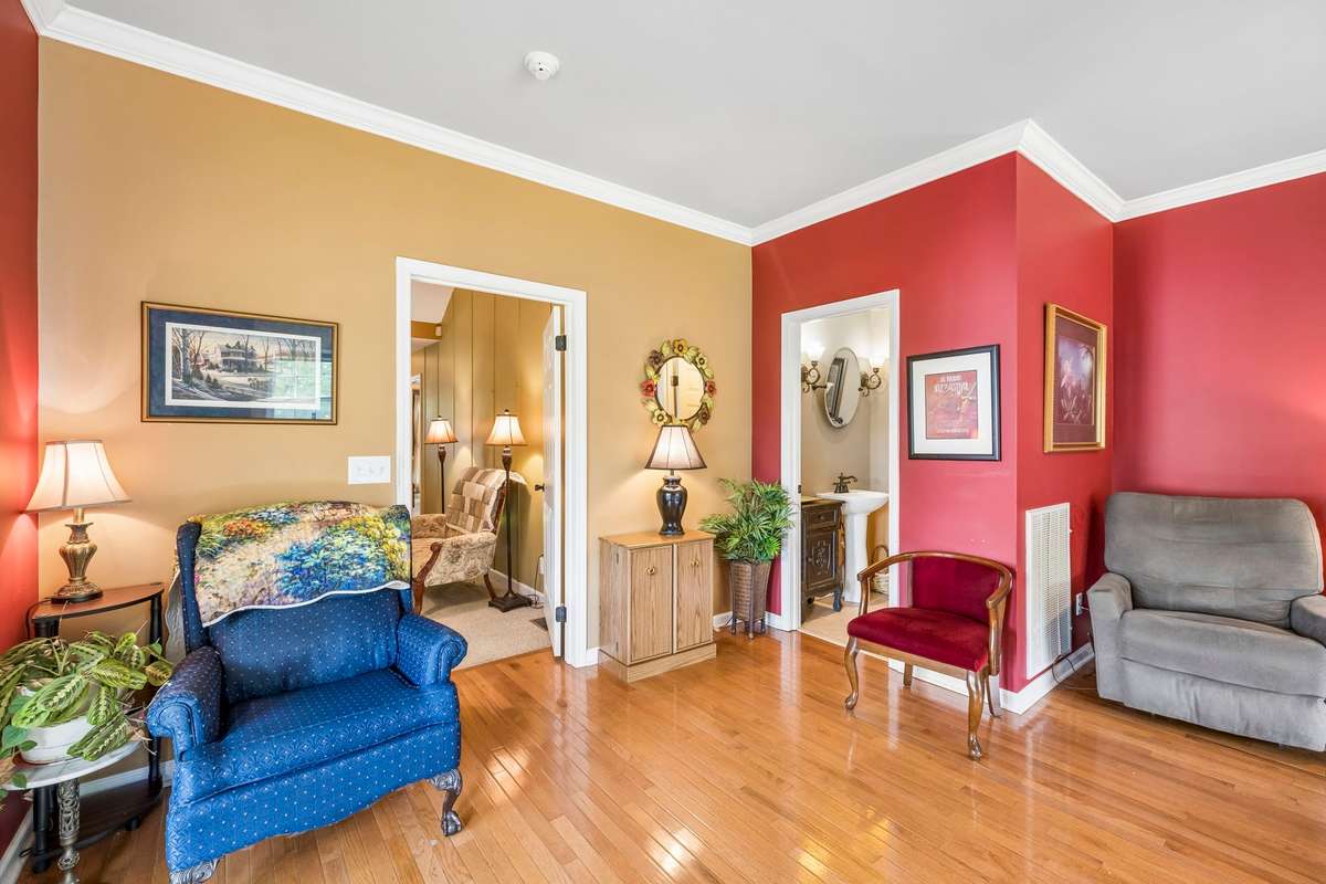 The half Bath is toward the back right.
