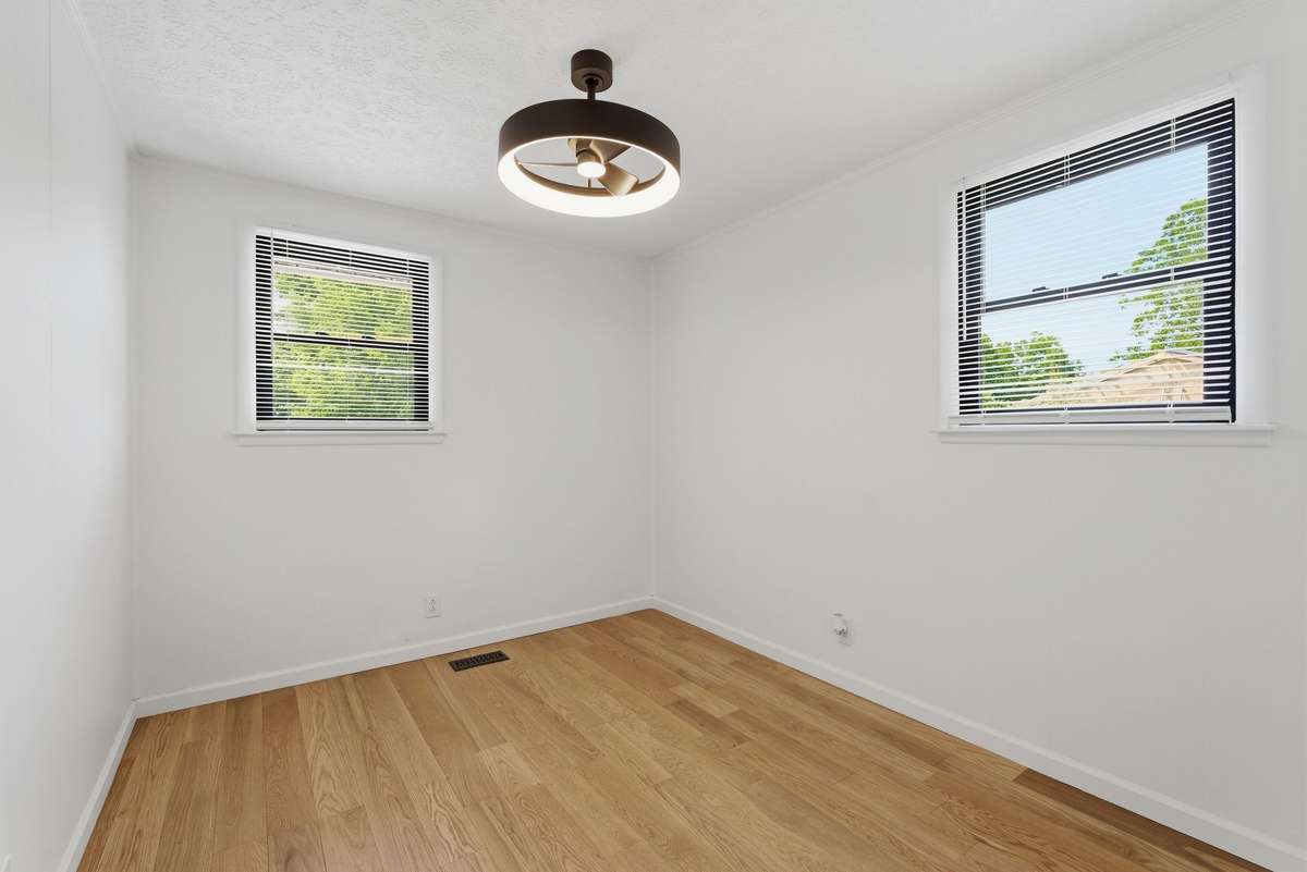 Second bedroom with updated lighting