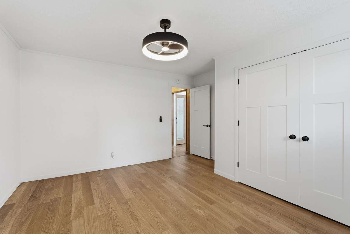 Third bedroom with updated lighting