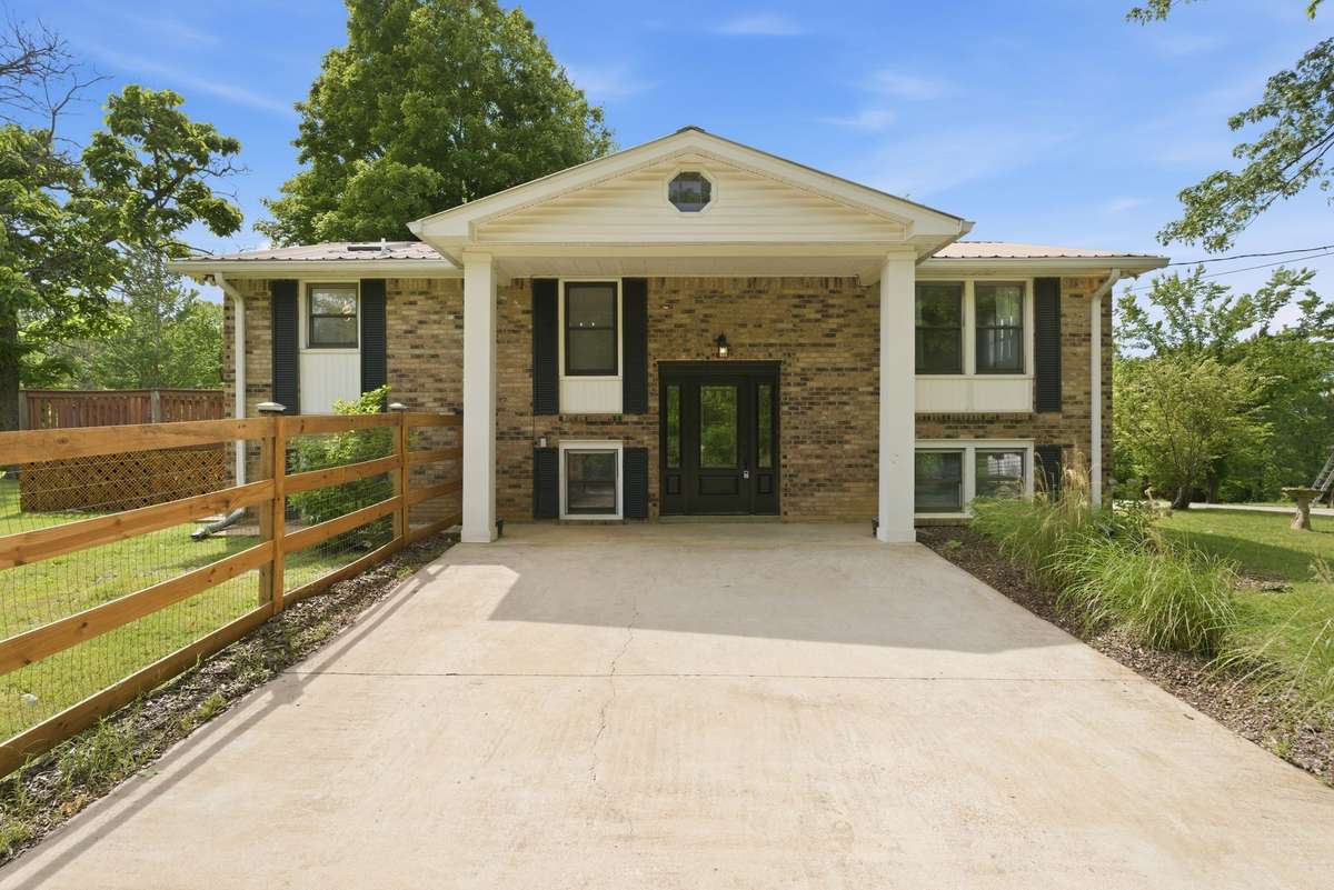 Beautifully maintained landscaping give the home excellent curb appeal