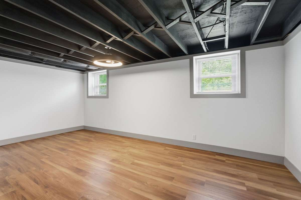 Primary suite with attached full bathroom and walk in closet