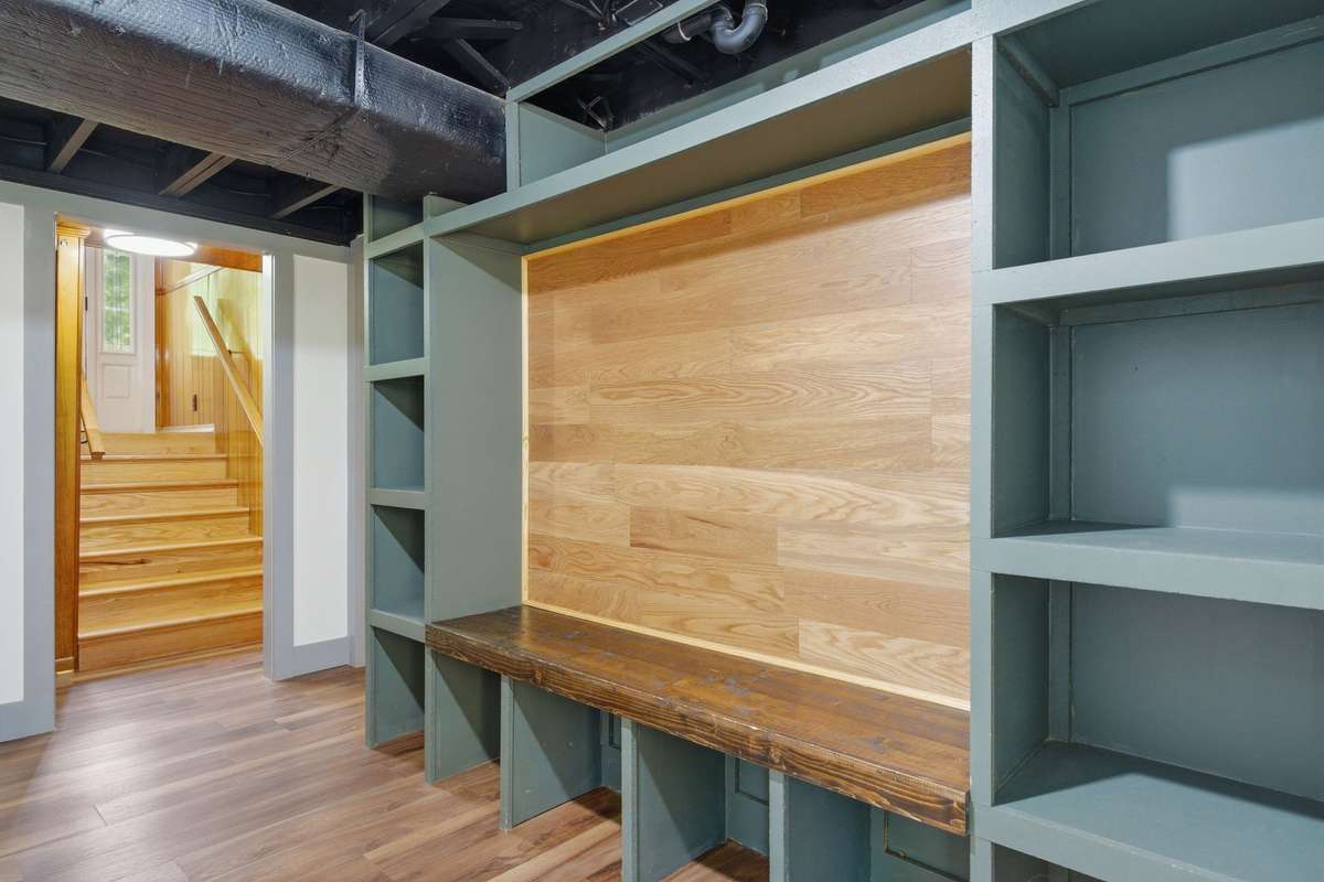 Awesome mud room with built in shelving and storage