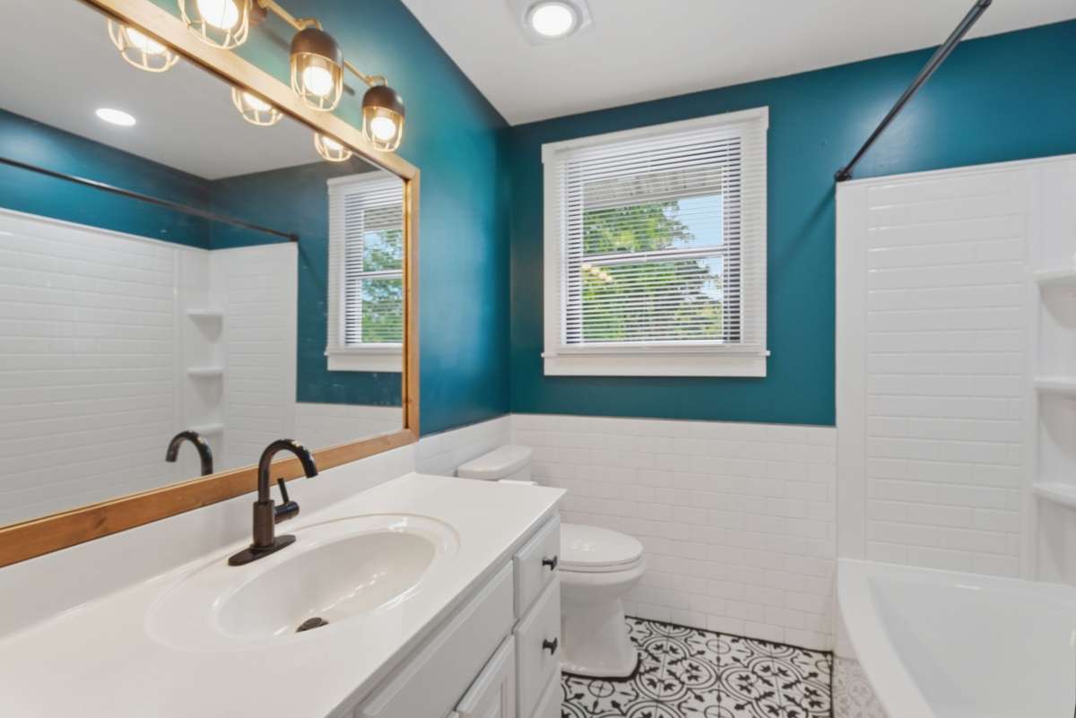 Full bathroom with tub shower combo