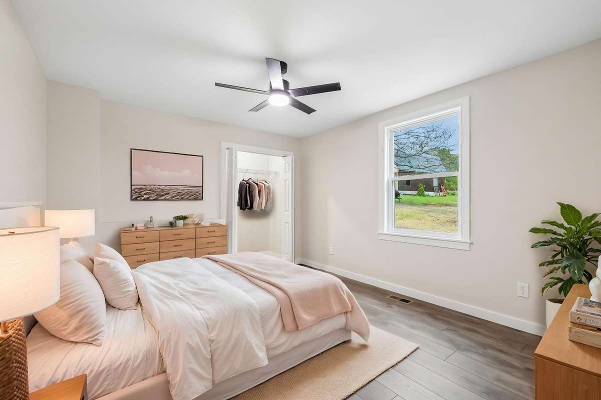 Bedroom has been virtually staged.