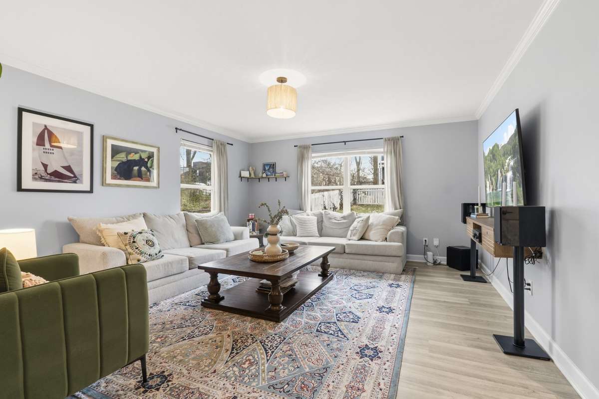 Alternate view of the spacious living room.
