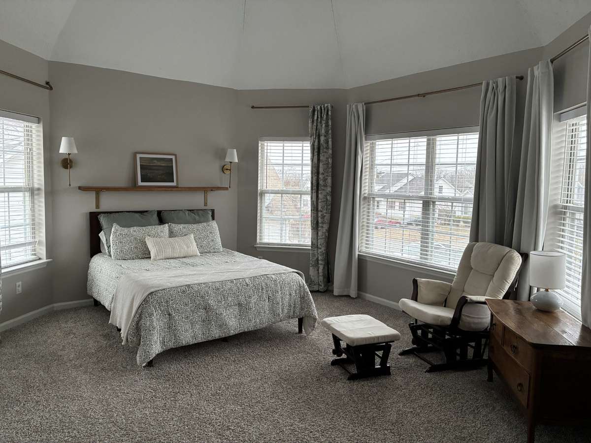 Bedrooms are generously sized with vaulted ceilings and ample closet space