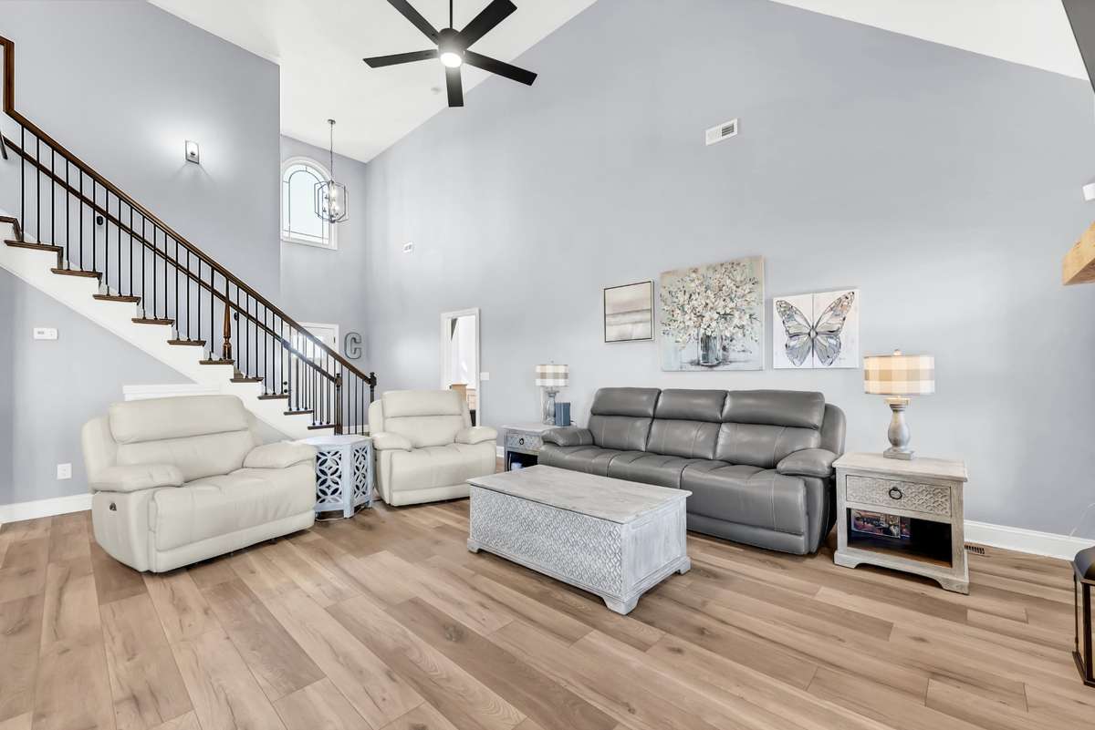 This image includes a virtual wall-color adjustment on the stairway, to showcase an alternate look. View the virtual tour to see the stairways current wall color.