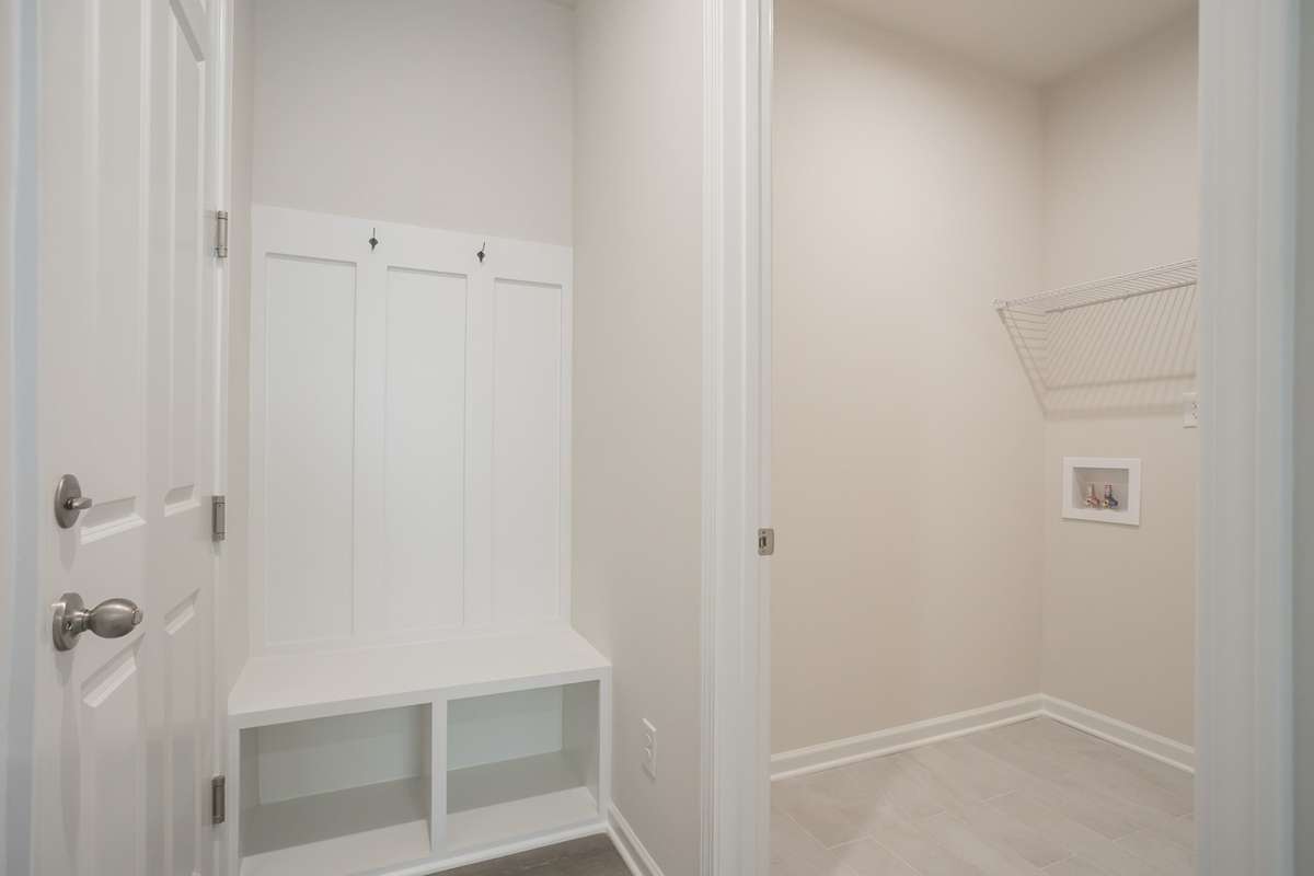 Entrance from garage-drop zone and laundry