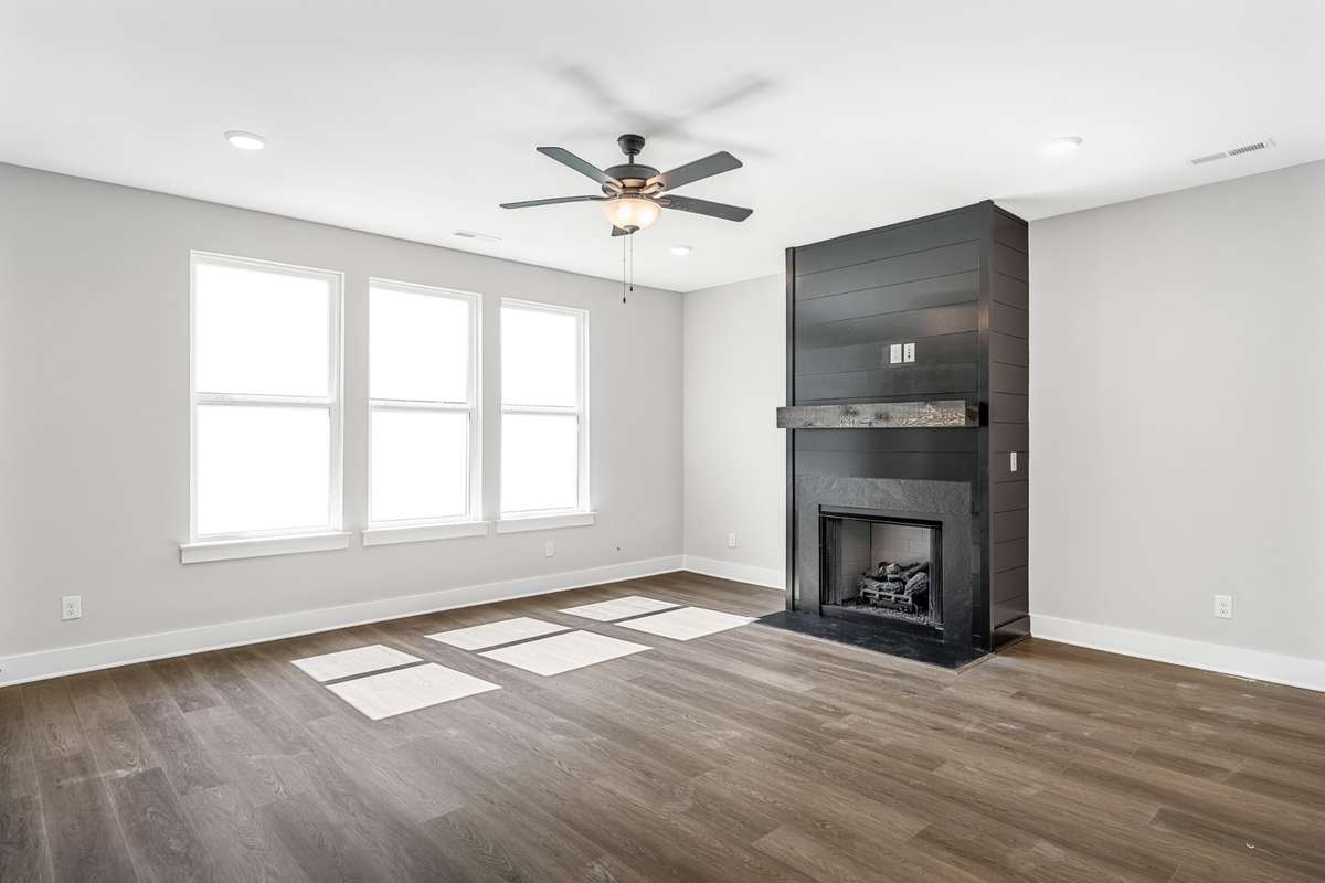 Model of the Henry floorplan.  Colors and selections may vary.  Gas fireplace option is available with shiplap surround.
