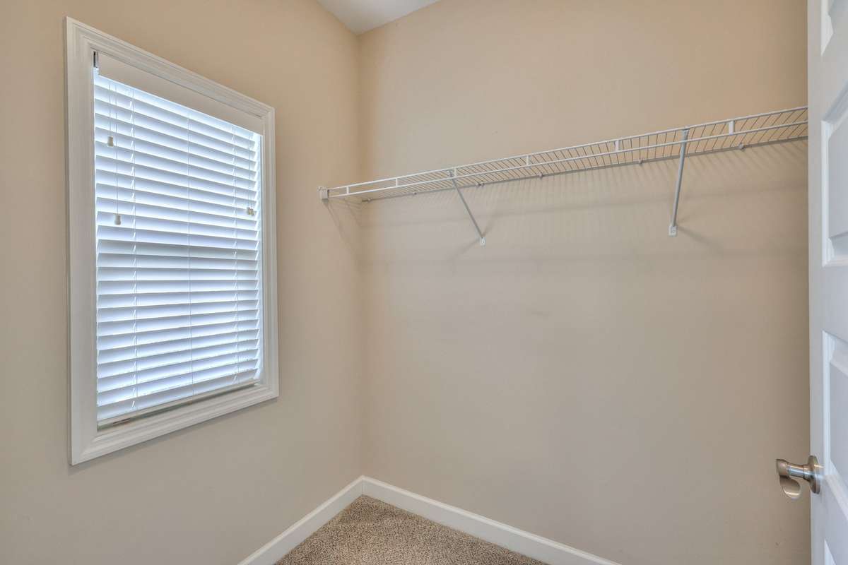 Walk in close with a window for natural light!!!!