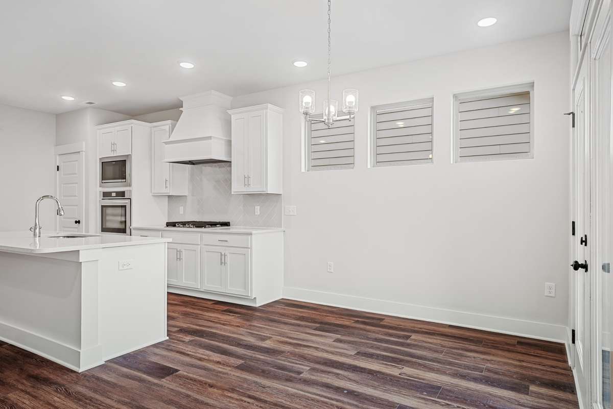 Picture of model home and not of actual home being built.  Gourmet kitchen will be in this home.
