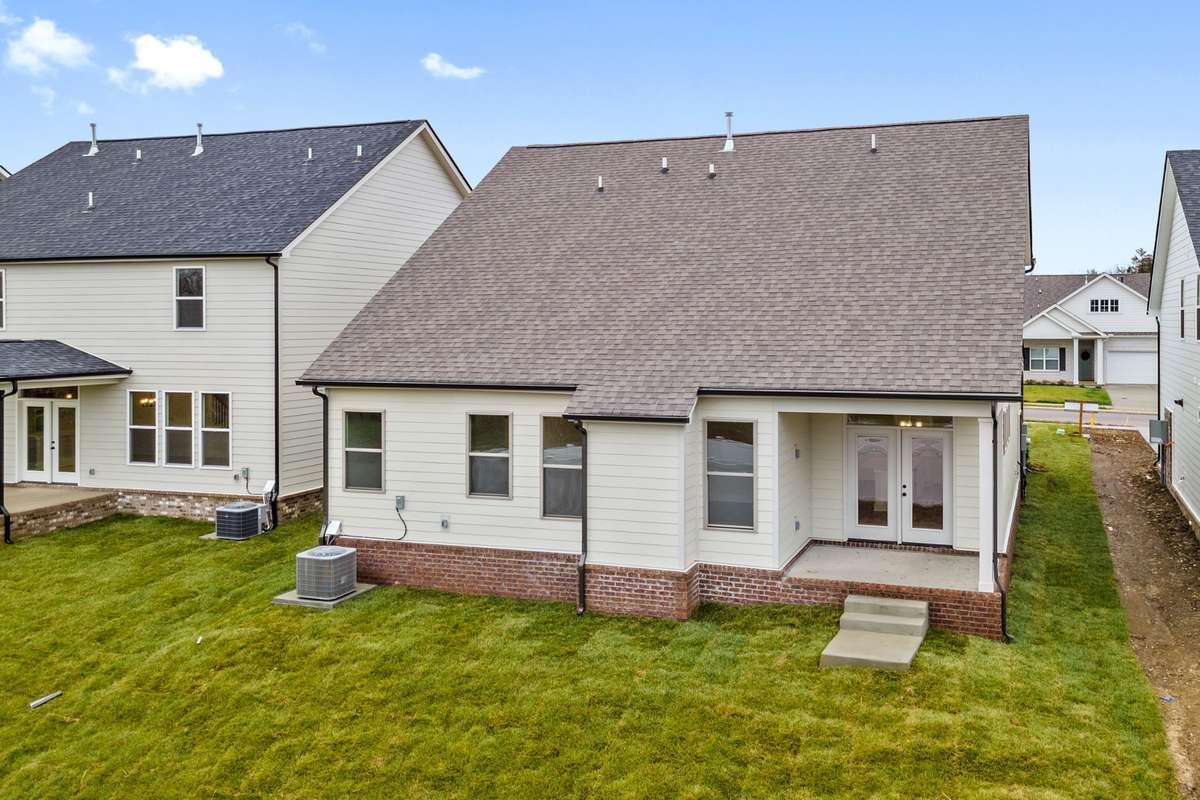 Picture of model home and not of actual home being built.  Covered patio included and this home will back up to a treeline