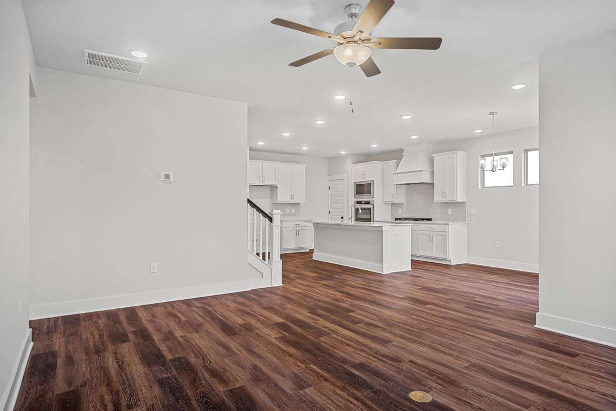 Picture of model home and not of actual home being built.  No railing available on stairs