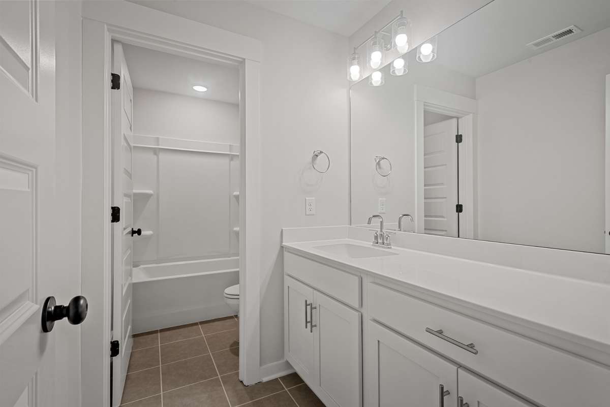 Picture of model home and not of actual home being built.