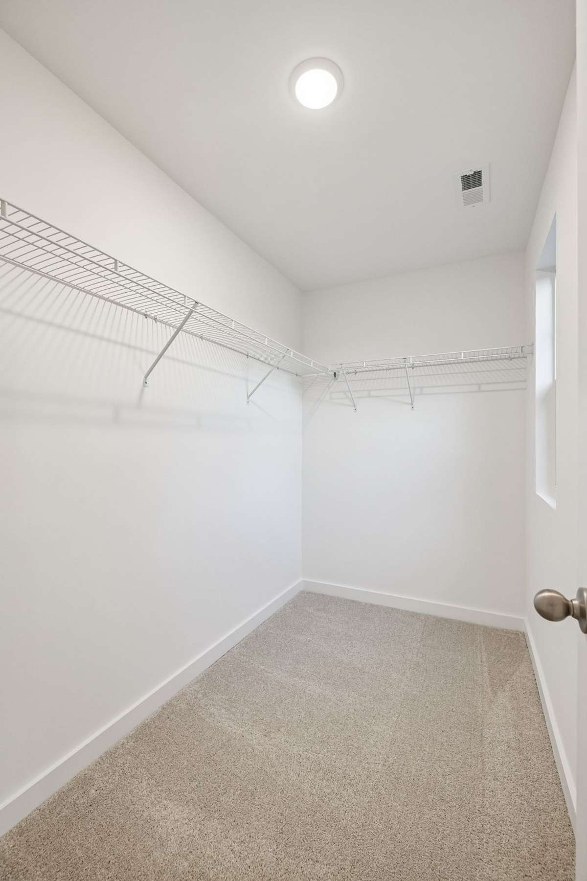 Picture of model home and not of actual home being built.  Check out the closet that will be on one of the secondary bedrooms.