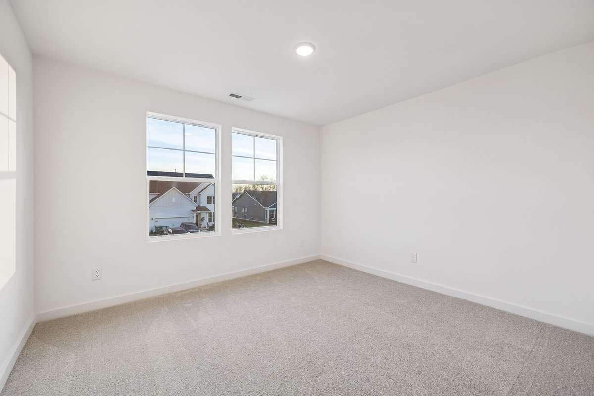 Picture of model home and not of actual home being built.  Spacious secondary bedrooms