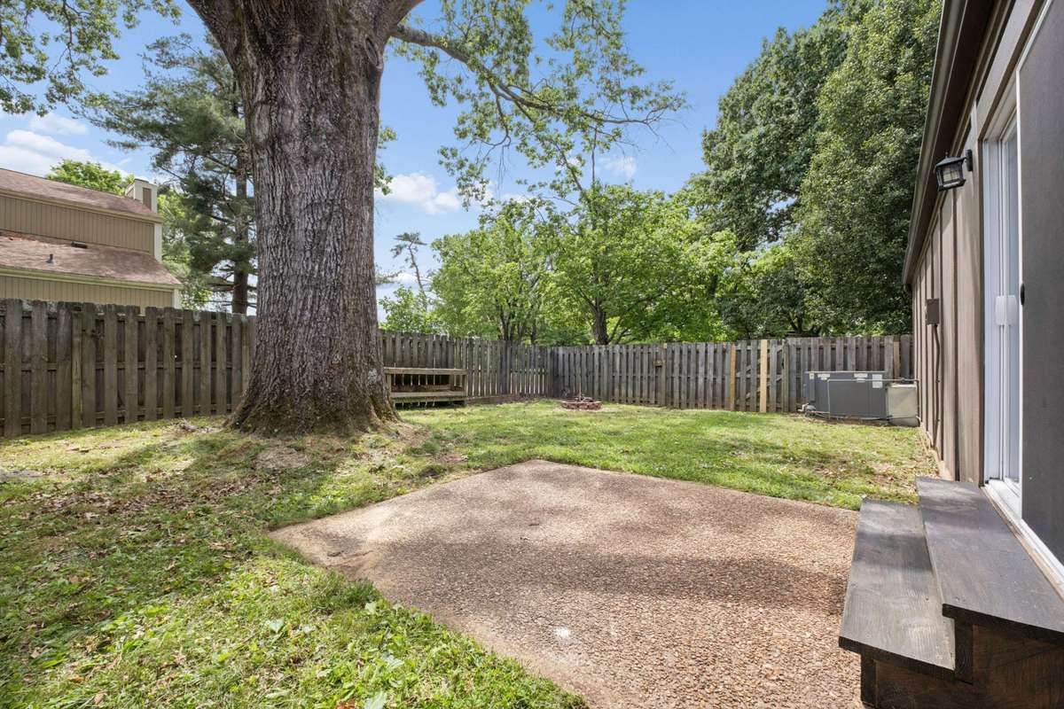 A larger fenced backyard in this neighborhood is uncommon!