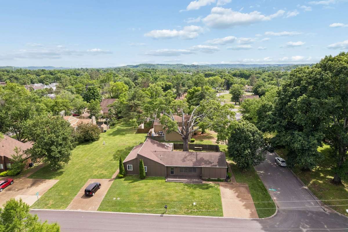 Corner lot with ample parking opportunities! Walkable neighborhood! Pool just down the street!