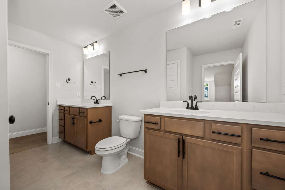 Pics are of previously completed home of same floorplan. Features and finishes may vary.