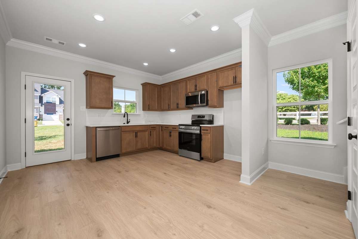 Pics are of previously completed home of same floorplan. Features and finishes may vary.
