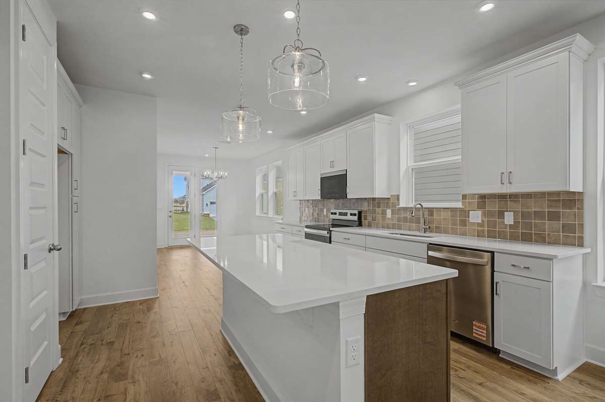 White cabinetry really brightens the space.