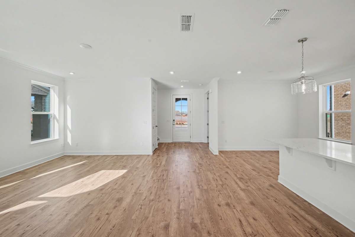 Open concept kitchen, great room and dining nook.