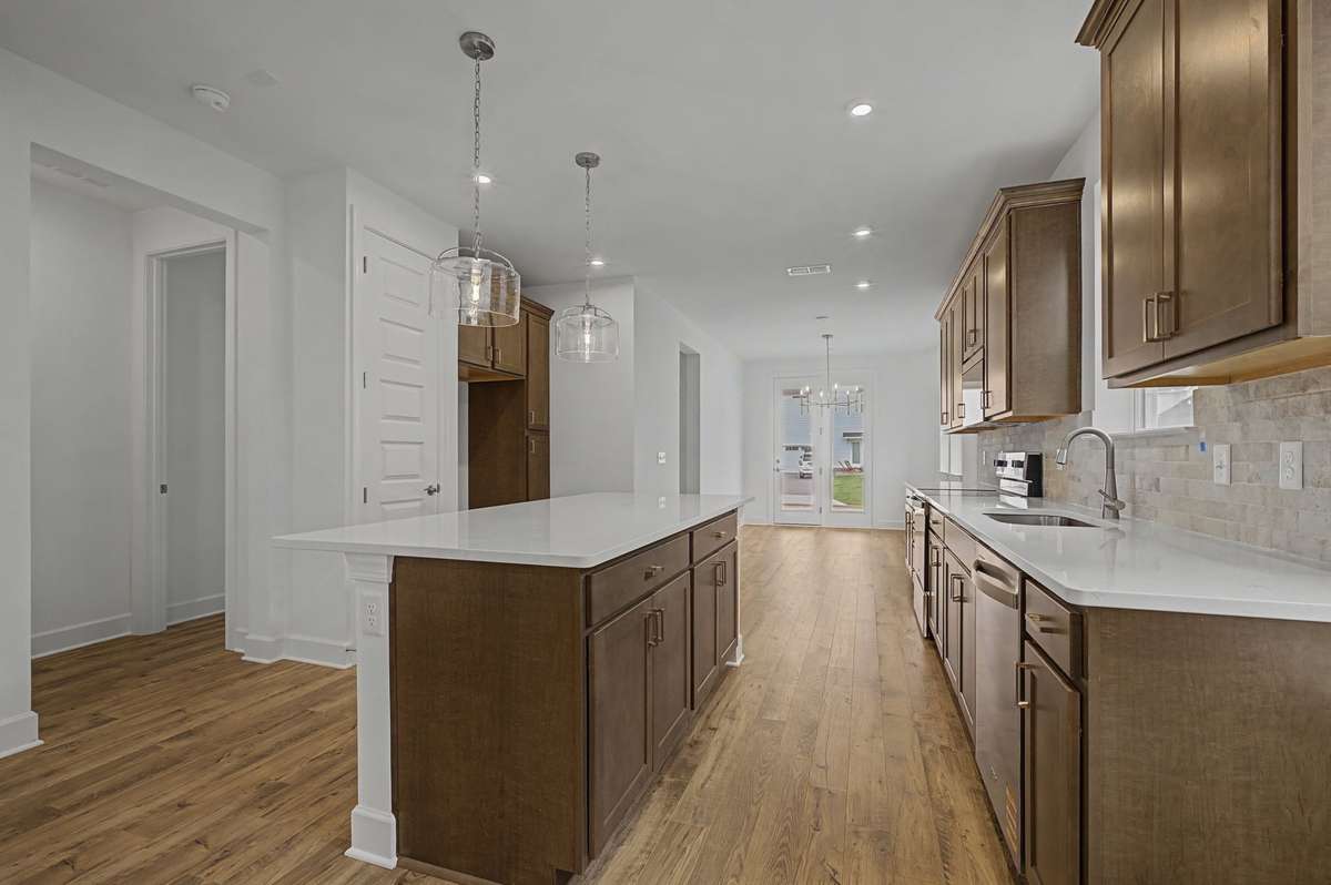 Beautiful burlap cabinetry throughout the kitchen.