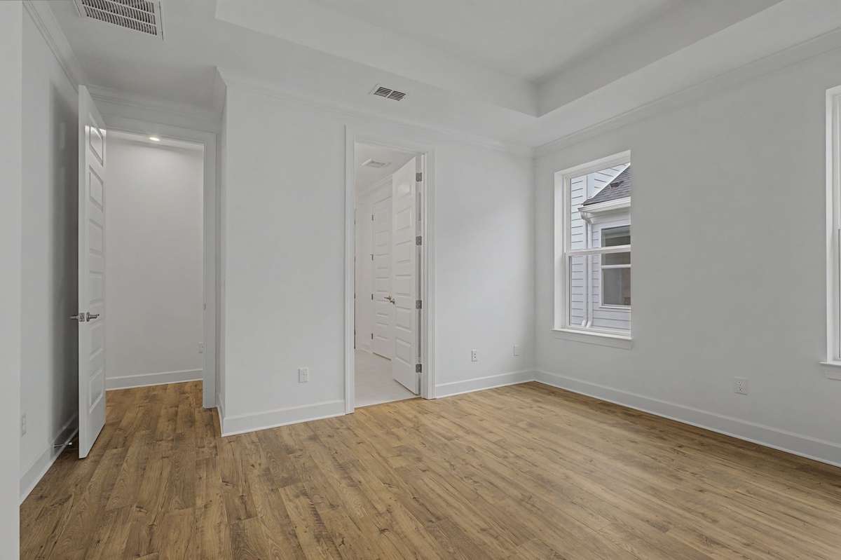 Primary Suite with hard surface flooring.