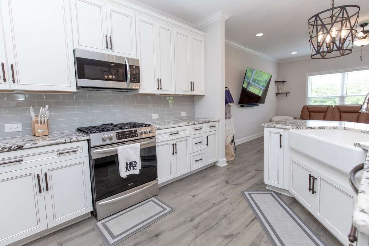 Elegant tile back splash and gas range