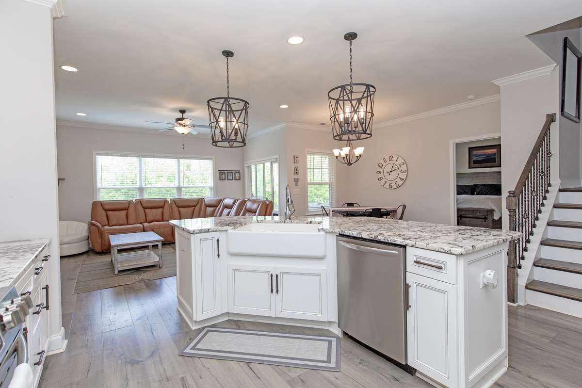 Large island opens into den and dining area. Perfect for family gatherings or entertaining.