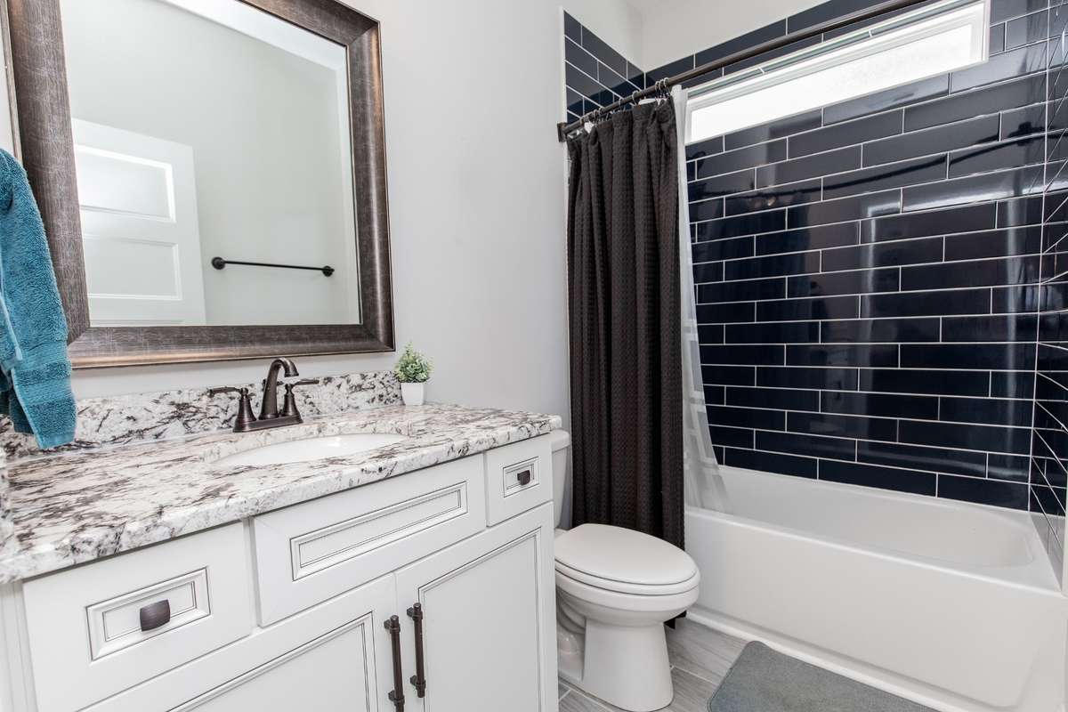 Gorgeous tile work and natural light for this bathroom