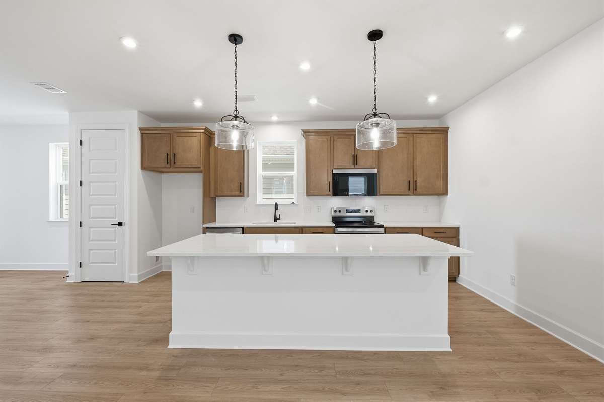 Stunning QUILL cabinetry in this office provides a cozy feel.