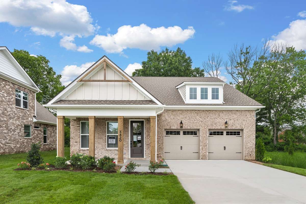 Elegant exterior elevation options feature brick on all four sides and cedar posts and shutters.
*Photos of staged Alamont model home