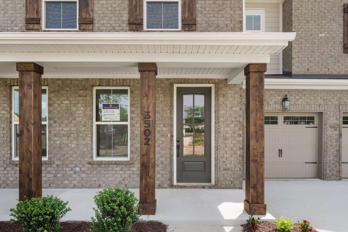 Covered front porch faces west-- perfect for sitting out and enjoying the sunsets!