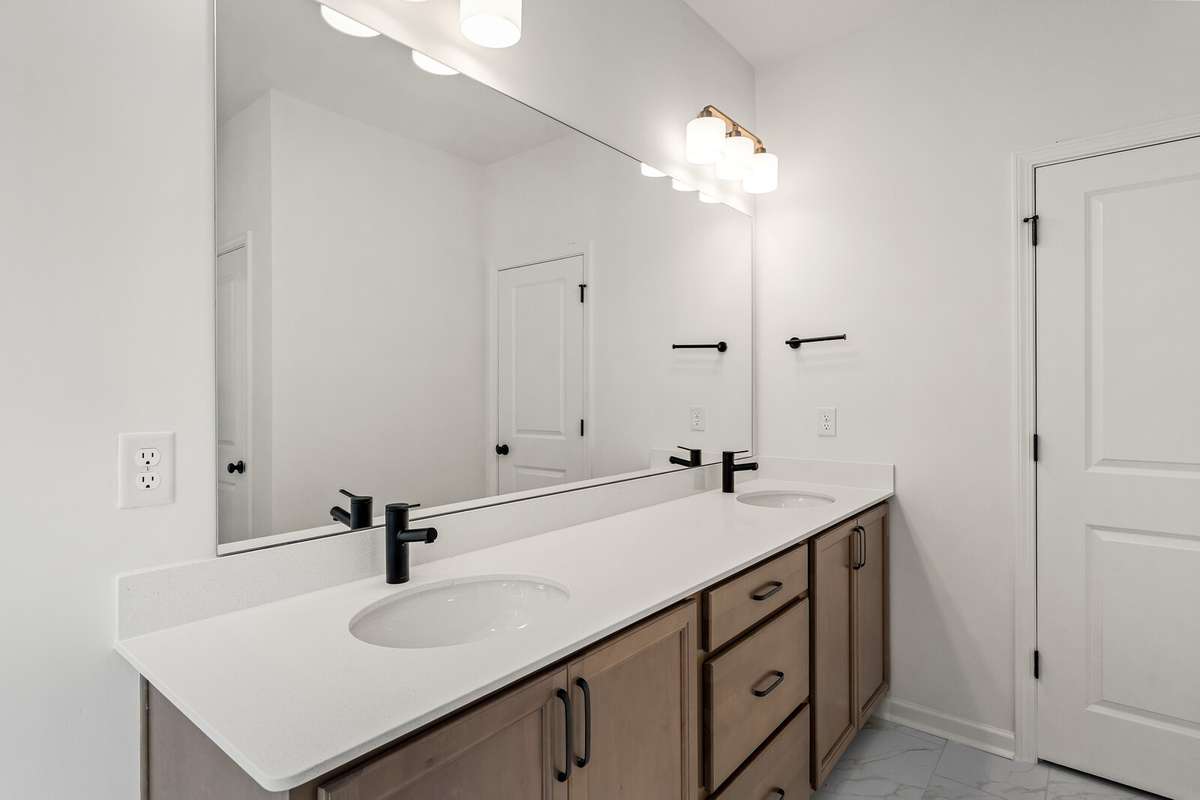 Primary Bathroom has a water closet for the toilet and a separate linen closet
