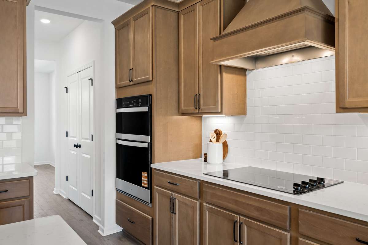 Pantry pass-through connects the kitchen to the dining/flex room