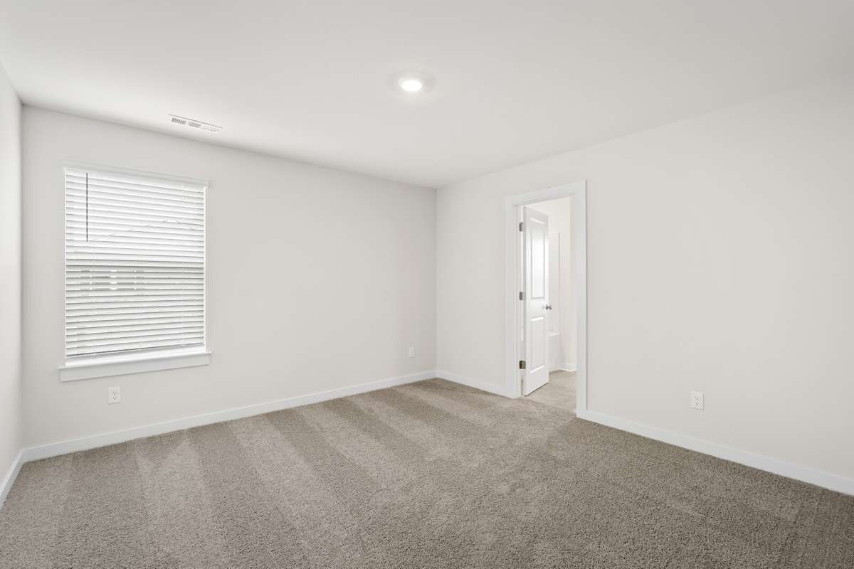 Bedroom #4 with an en-suite bath!
*Photo of a previously built Chelsey