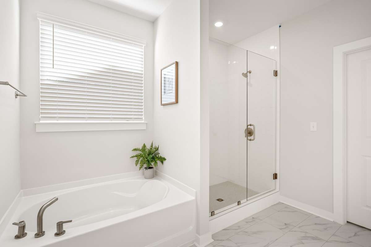 Separate tub and shower
*Photo of a previously built Chelsey