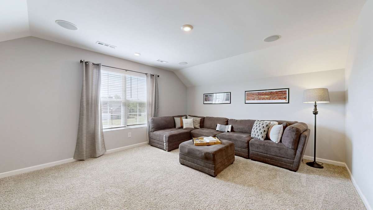 Upstairs extra large bonus room connected to the guest suite.